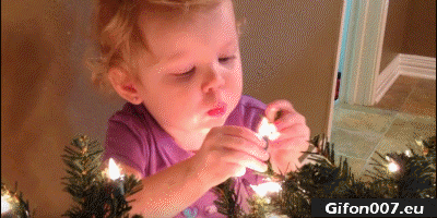 christmas-tree-candles-blow-out-child